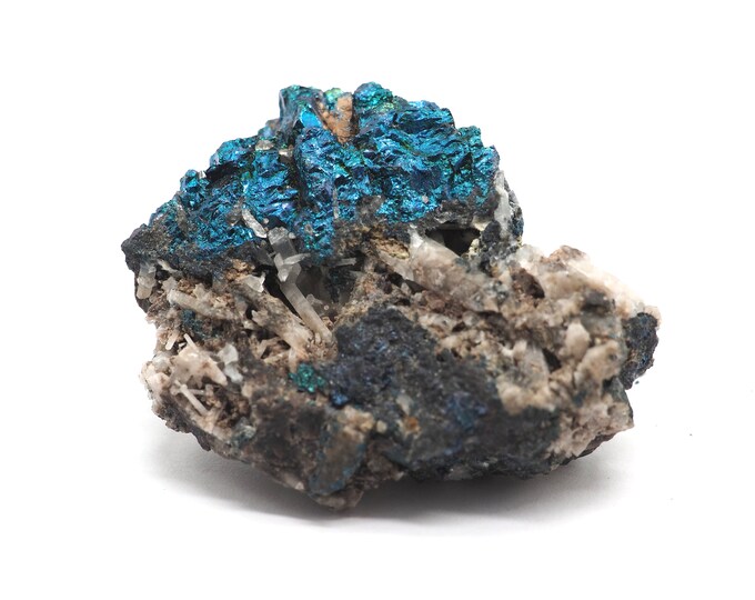 Bornite with quartz 50mm x 45mm (50 grams). Ethically sourced and fair trade mineral. Pure energy. Beautiful quality. Bornite from Morocco.
