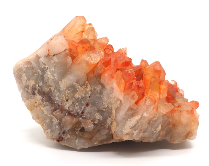 Rock crystal cluster with hematite layer 120mm x 65mm - 507 grams. Fair trade crystals and minerals. Ethically sourced.