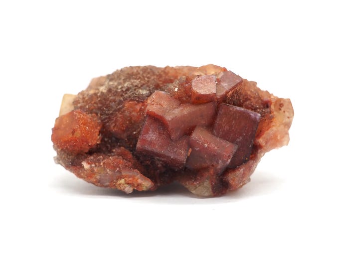 Fluorite cluster 35mm x 25mm (29 grams). Unique and special. Cubes. Ethically found and fair trade. Hematite layer. Crystals from Morocco.