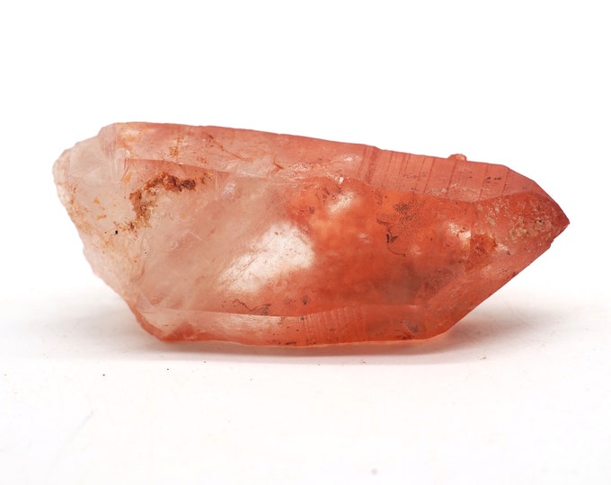 Quartz rod with hematite layer 60mm x 25mm - 34grams. Ethically sourced and fair trade mineral.