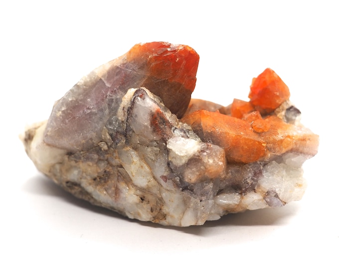 Rock crystal points with a hematite layer 70mm x 40mm - 88 grams