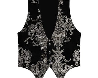 May include: Black vest with a silver floral pattern. The vest has a V-neck and three silver buttons down the front. The back of the vest is solid black.