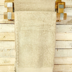 Double tiered Towel Rack made from authentic reclaimed Wine/Whiskey Barrel Wood.
