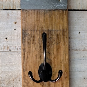 Hat/Coat hanger made from authentic reclaimed wine or whiskey barrel wood.