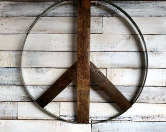 Unique hanging Peace Sign made from Authentic reclaimed Wine/Whiskey Barrel wood.