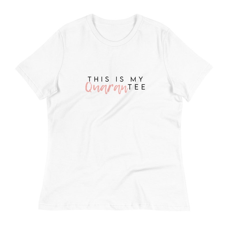 May include: White t-shirt with the text "This is my Quarantee" in black and pink lettering.