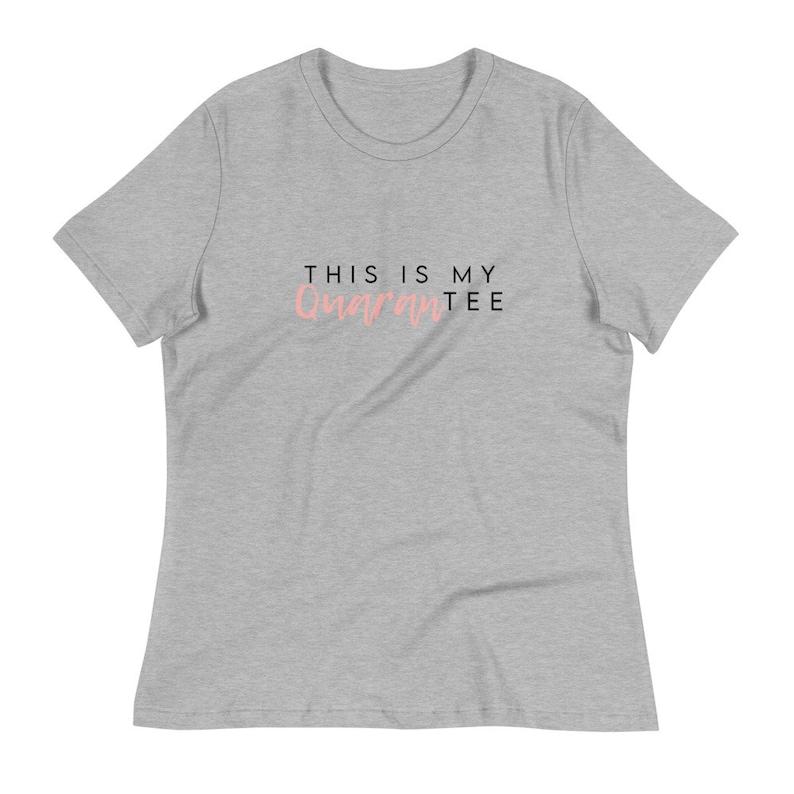 May include: A heather gray t-shirt with the text "This is my Quarantee" in black and pink.