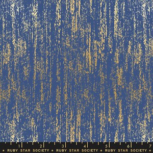 May include: Blue fabric with a gold metallic finish. The fabric has a textured, brushed look. The fabric is printed with the text "RUBY STAR SOCIETY" in black.