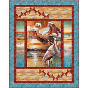 May include: A quilt featuring a painting of two white herons standing in a marsh at sunset. The quilt is framed with a red and blue border and has a geometric pattern of red and white triangles.