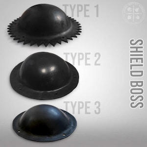 May include: Three black metal shield bosses arranged vertically. Type 1 has a serrated edge, Type 2 has a smooth circular flange with holes, and Type 3 is a smaller smooth circular boss with holes. The text reads SHIELD BOSS, TYPE 1, TYPE 2, TYPE 3.