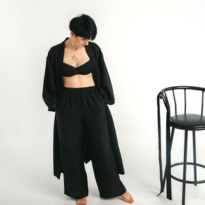 Long wide trousers and black kimono.