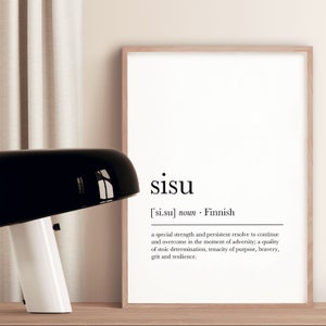 May include: A framed print with a white background and black text. The text defines the Finnish word "sisu" as a special strength and persistent resolve to continue and overcome in the moment of adversity. It also describes it as a quality of stoic determination, tenacity of purpose, bravery, grit and resilience.