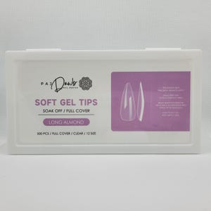 May include: A white plastic container with a purple label that reads "PAJ Dawb Nail Design" and "Soft Gel Tips Soak Off/Full Cover Long Almond 500 PCS/Full Cover/Clear/12 Size". The label also shows two clear long almond shaped nail tips.