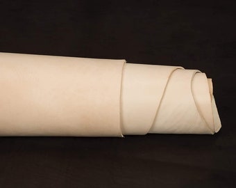 Garbowana roślinnie skóra bydlęca cięta w kształcie litery V, jedno ramię, grubość 2–4 mm (5–9 uncji), waga w metrach kwadratowych, skóra narzędziowa bydlęca