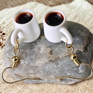 Coffee cup earrings with realistic coffee.