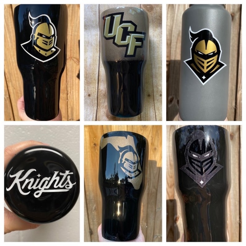 Puede incluir: Seis vasos diferentes de color negro y dorado con varios dise&ntilde;os. Los dise&ntilde;os incluyen un casco de caballero, las letras UCF y la palabra "Knights".