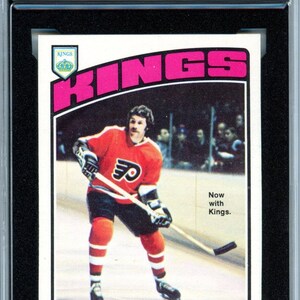 Cartão de hóquei Dave Schultz #150 da OPC O-Pee-Chee de 1976/77, classificado como KSA 8.5.