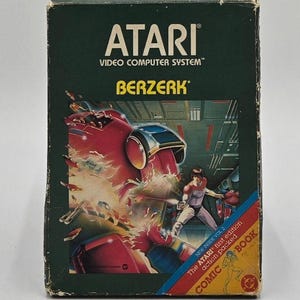 Cartouche de jeu vidéo Atari Berzerk de 1980, dans sa boîte.