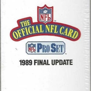 May include: A white card with the NFL logo and the text "THE OFFICIAL NFL CARD" in red and yellow. Below, the text "PRO SET" and "1989 FINAL UPDATE" are displayed.