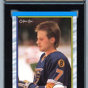 Tarjeta de novato calificada KSA 10 de Cliff Ronning, OPC O-Pee-Chee n.° 45, 1989/90