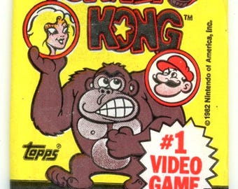 Paquete de cera sin abrir de Donkey Kong de Topps Nintendo de 1982 (3 tarjetas / 3 pegatinas). Posible ficha de Mario Rookie.