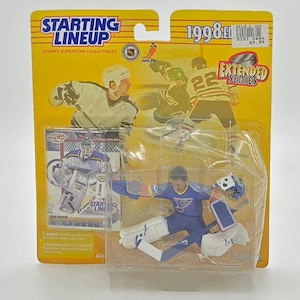 1998 Kenner, composition de départ de la LNH, figurine et carte de hockey Grant Fuhr, St Louis Blues