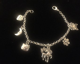 Eleganza Charm Bracelet, Silver Chain, six or more charms, SML sizes