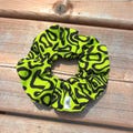 Lando Norris Helmet Inspired Scrunchie | LN4 Blobs | McLaren product logo