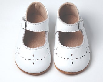 infant off white sneakers