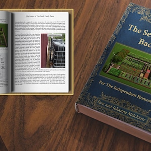 May include: A blue book with gold lettering titled "The Self-Sufficient Backyard: For The Independent Homesteader" by Ron and Johanna Melchiorre. The cover features an aerial view of a garden with a greenhouse and a house.