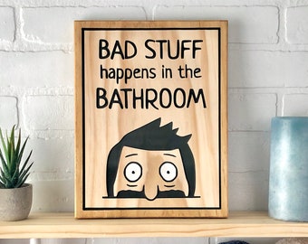 Bob's Burgers Bad Stuff Happens in the Bathroom Wooden Sign Wall Decor