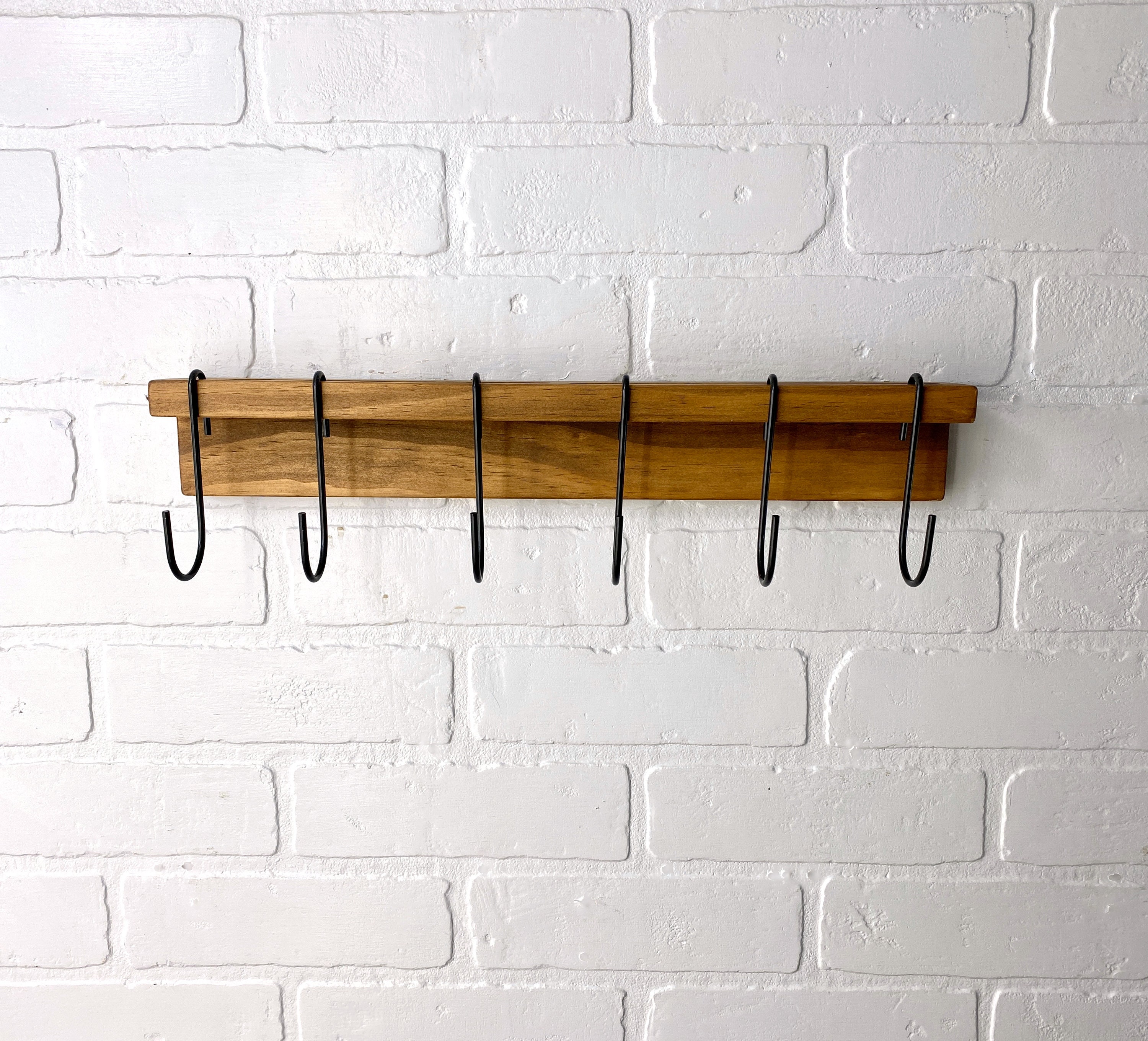 Colgador de sartenes de madera sale