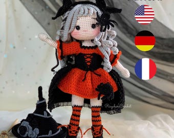 May include: Crocheted doll in a Halloween witch costume, featuring a black hat, orange and black dress, and striped stockings. The doll has gray hair and a spider accessory. The image includes the text "PDF Pattern".
