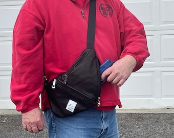 Maney sling pack concealed carry