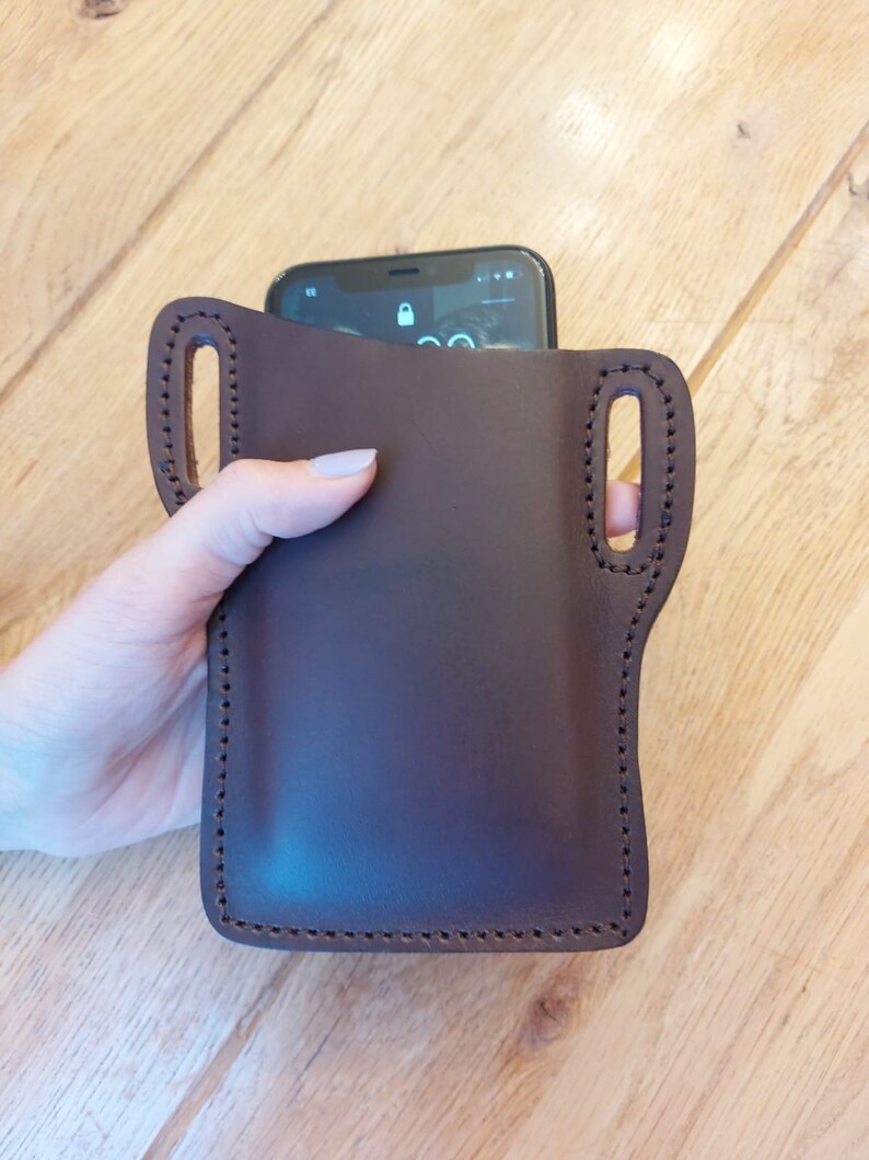 /'pancake/' style iPhone case Will take any model in veg tanned leather slides on your belt Custom made