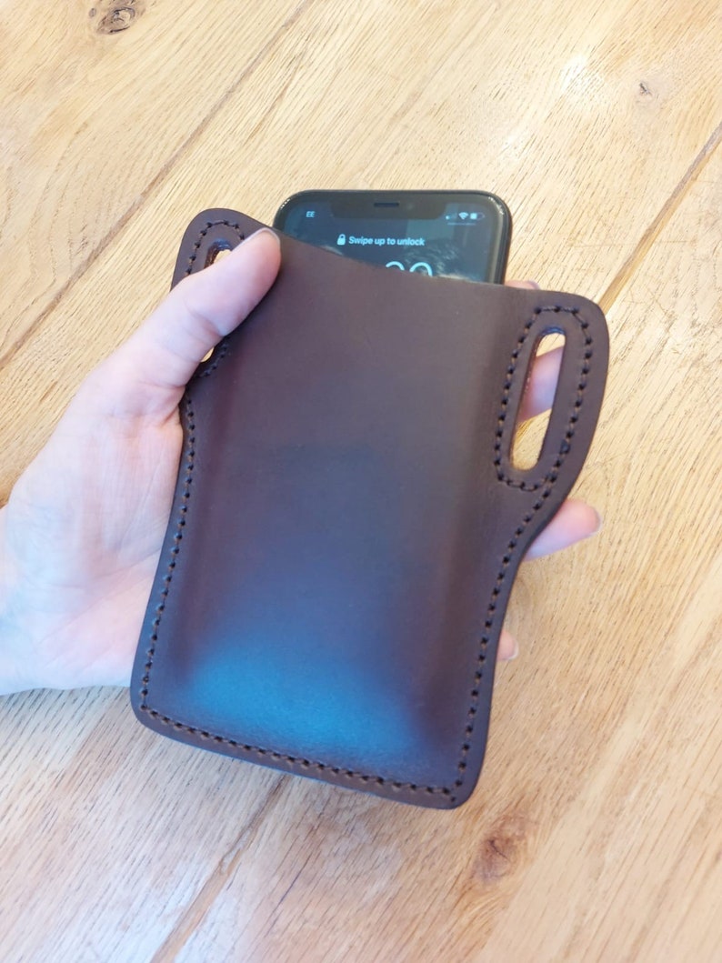 /'pancake/' style iPhone case Will take any model in veg tanned leather slides on your belt Custom made