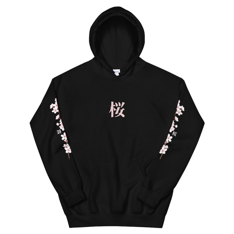 May include: Black hoodie with a pink Japanese character "桜" (Sakura) on the front and pink cherry blossom branches on the sleeves.