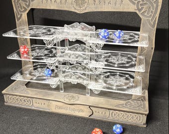 May include: A wooden dice tower and display case with clear acrylic shelves. The tower has decorative carvings and the text "Ancient Legends". Several multi-sided dice in red and blue are visible.