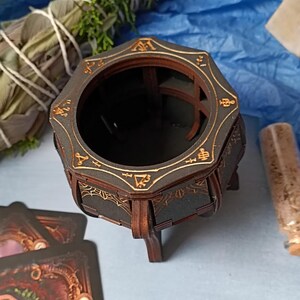 Rustic Wiccan wooden cauldron box with intricate gothic engravings, aged finish for a mystical look, handcrafted fantasy storage chest for jewelry, runes, potions, and herbs, enchanted spell jar organizer, witchy altar accessory for pagan rituals, dark academia-inspired gothic decor, handmade Halloween witchcraft keepsake, perfect occult-themed home accent, mystical wooden trinket holder, unique handcrafted magic potion storage, gothic fantasy home decor for witches and spellcasters