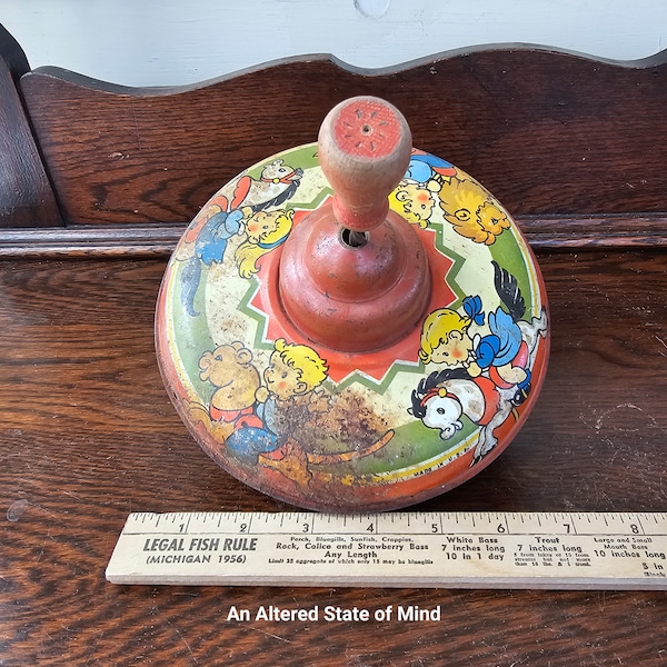 Vintage metal spinning top toy tin litho pony ride carousel round lithograph 1950s spin toy wood handle retro childhood nostalgia metal top