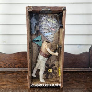 Escape Room assemblage art, shadow box, intrusive thoughts, mixed media found object art, 3d collage, unique weird art, wall hanging