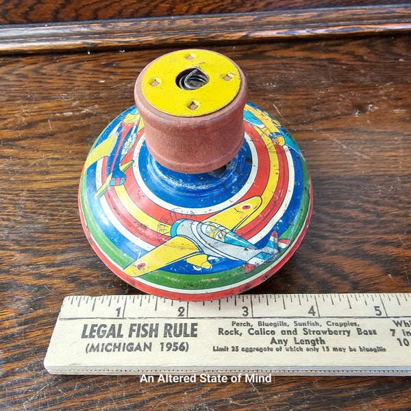 Vintage metal spinning top toy tin litho round top toy airplane lithograph 1950s spin toy wood handle retro childhood nostalgia metal top