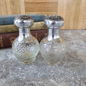 Vintage Avon Perfume Bottle: Ornate Silver Lid, Collectible Figurine