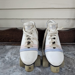 Patins à roulettes en fer vintage