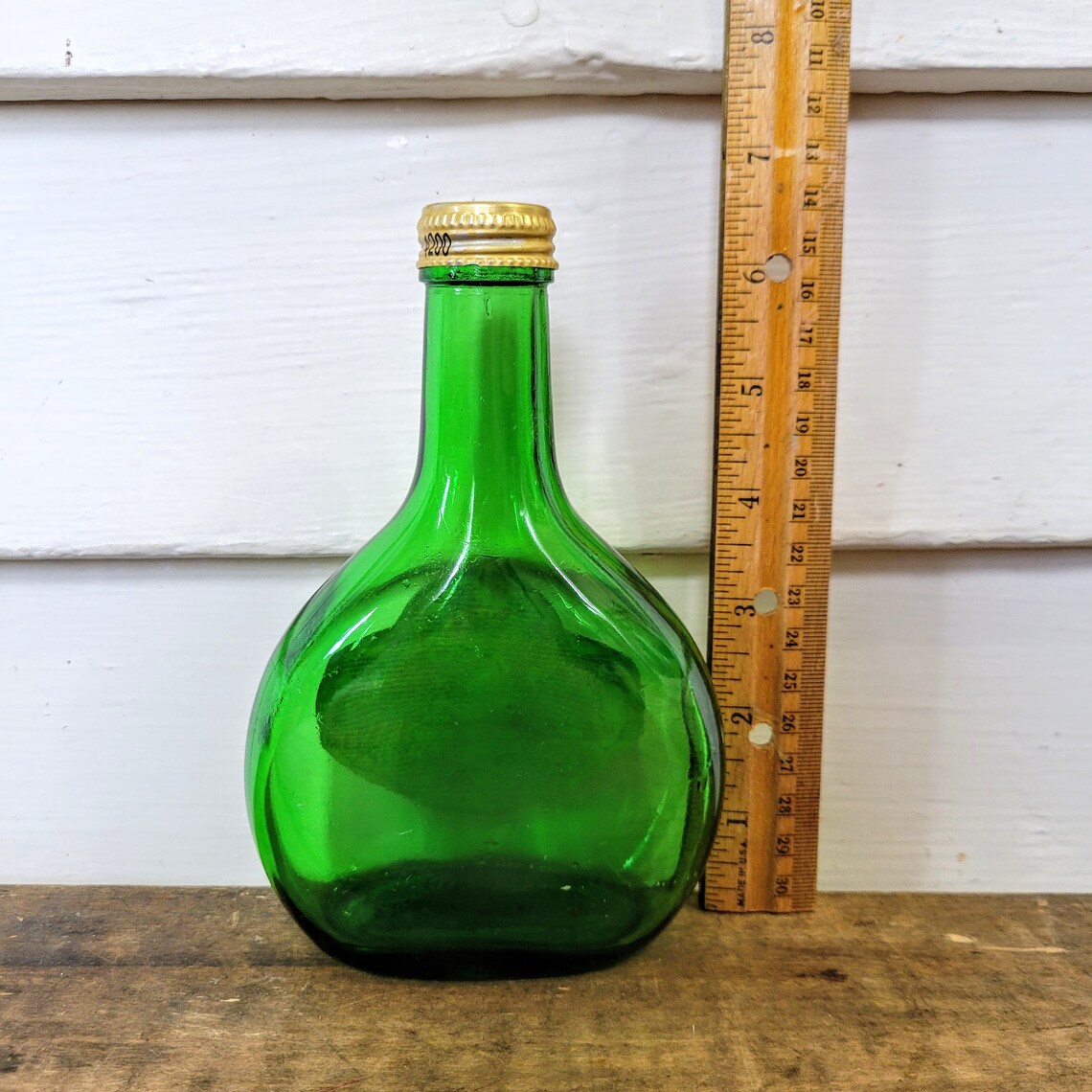 Vintage 7 inch green glass alcohol bottle with German label Etsy