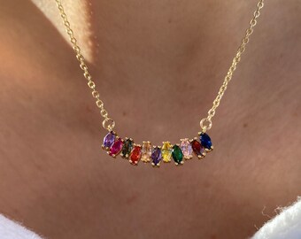 Golden necklace with rainbow pendant