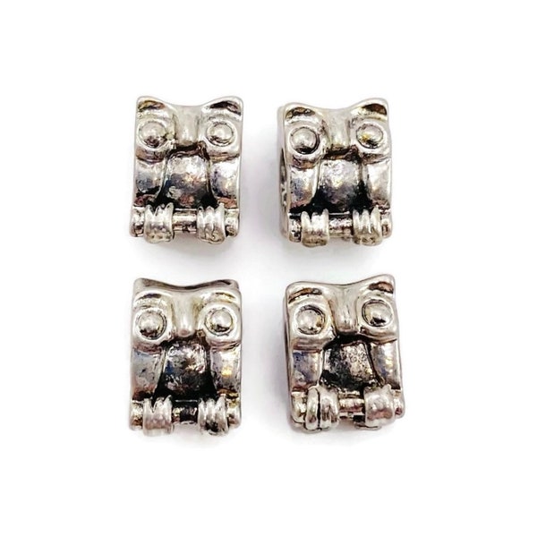 Lot de 4 perles hibou étain grand trou ton argent antique