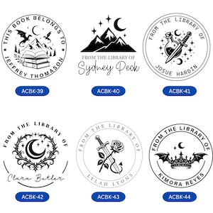 May include: Six circular black and white custom book embosser designs featuring various motifs including mountains, dragons, open books, swords, potion bottles, roses, moons, stars, and crowns, each with personalized names and library text labels.