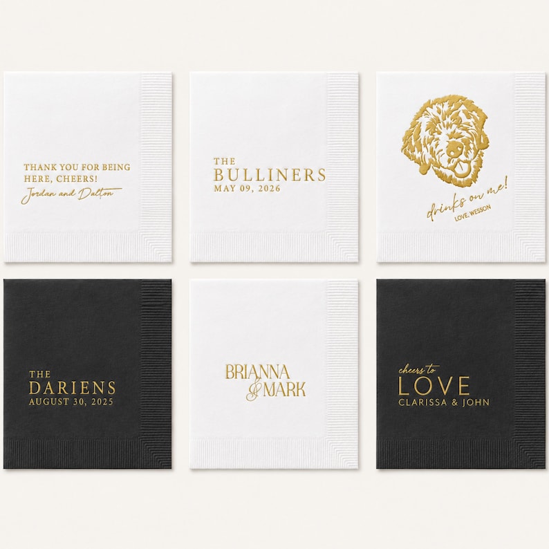 May include: A set of six square paper napkins in white and black, featuring gold foil text and graphics. Designs include personalized names, dates, and phrases like 'Thank you for being here, cheers!', 'The Bulliners', and 'Drinks on me, love Wesson'.