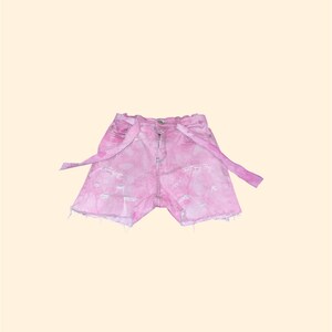 Shorts vaqueros desgastados teñidos de rosa para niñas